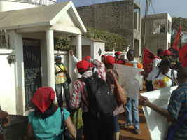 15) Protestors demand that the Ambassador comes ouside to address their concerns
